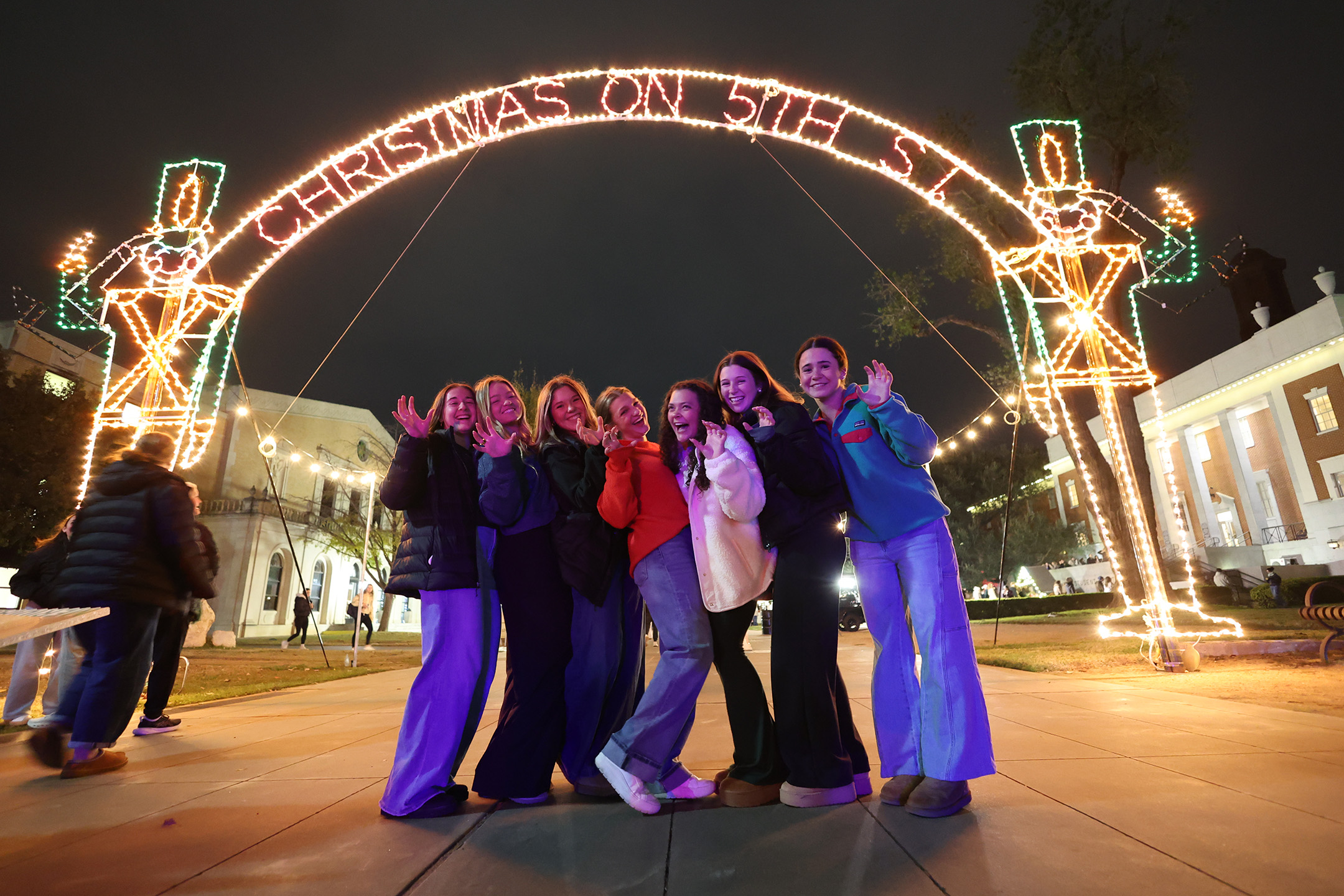Students attending Baylor University's Christmas on 5th Street event