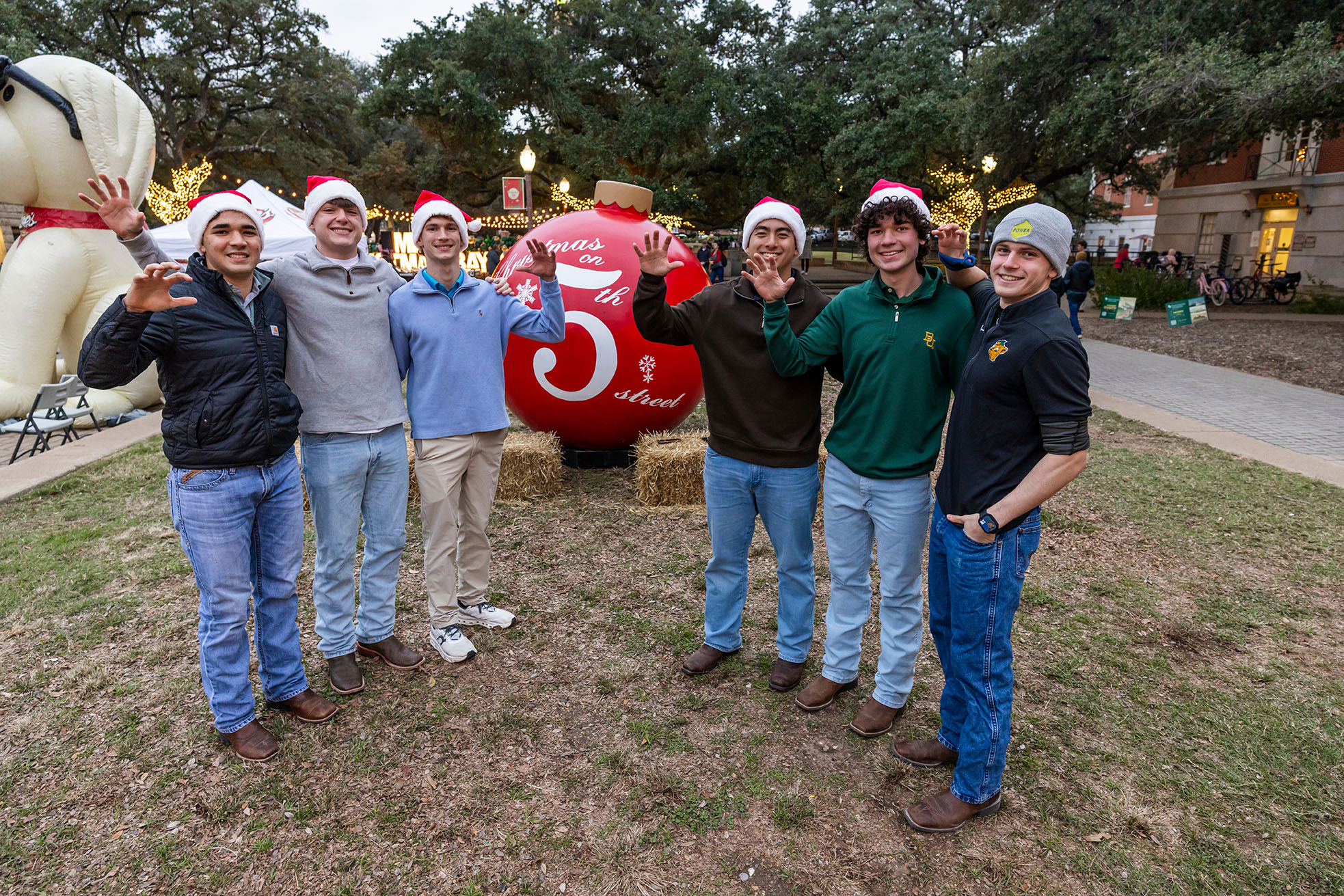Students attending Baylor University's Christmas on 5th Street event